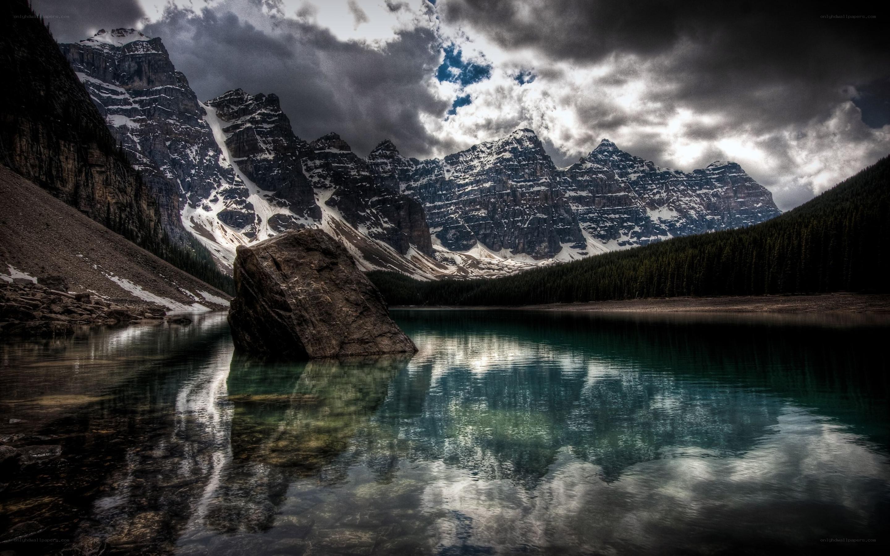Mountain lake under stormy sky