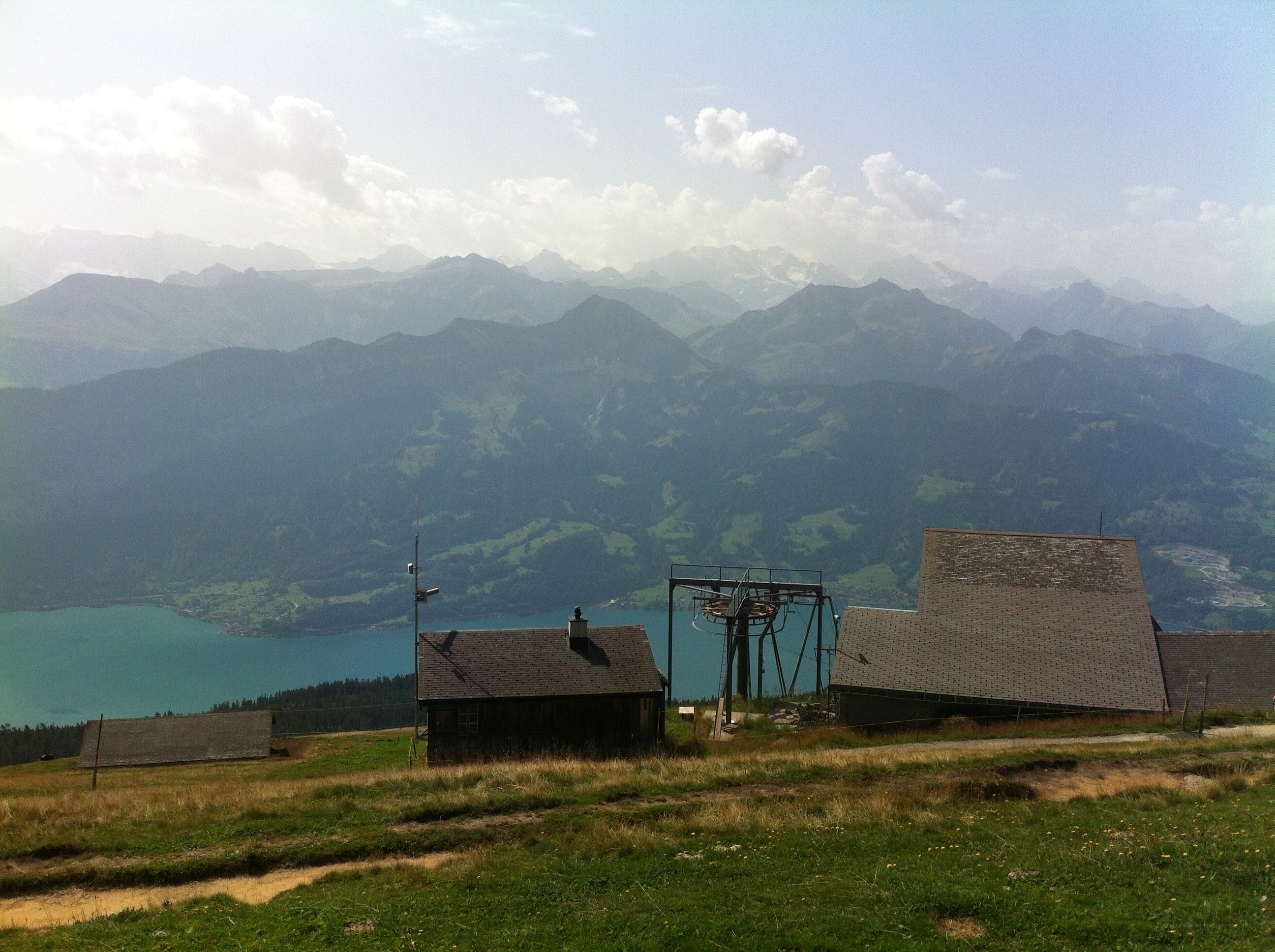 Mountain lake view with cabins