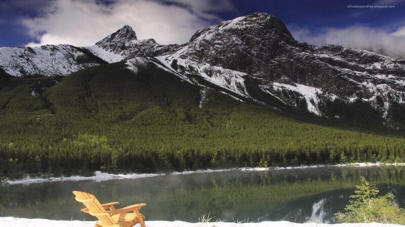 Mountain lake with Adirondack chair