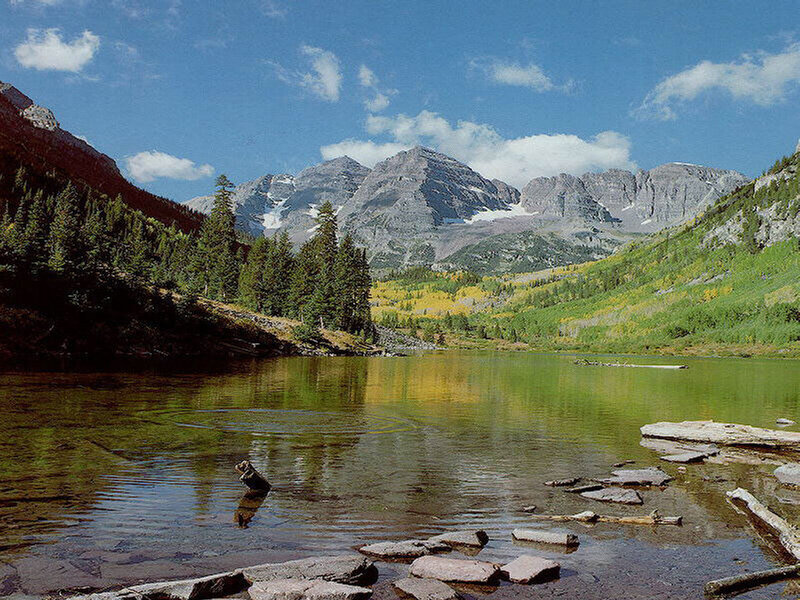 mountain lake with autumn foliage