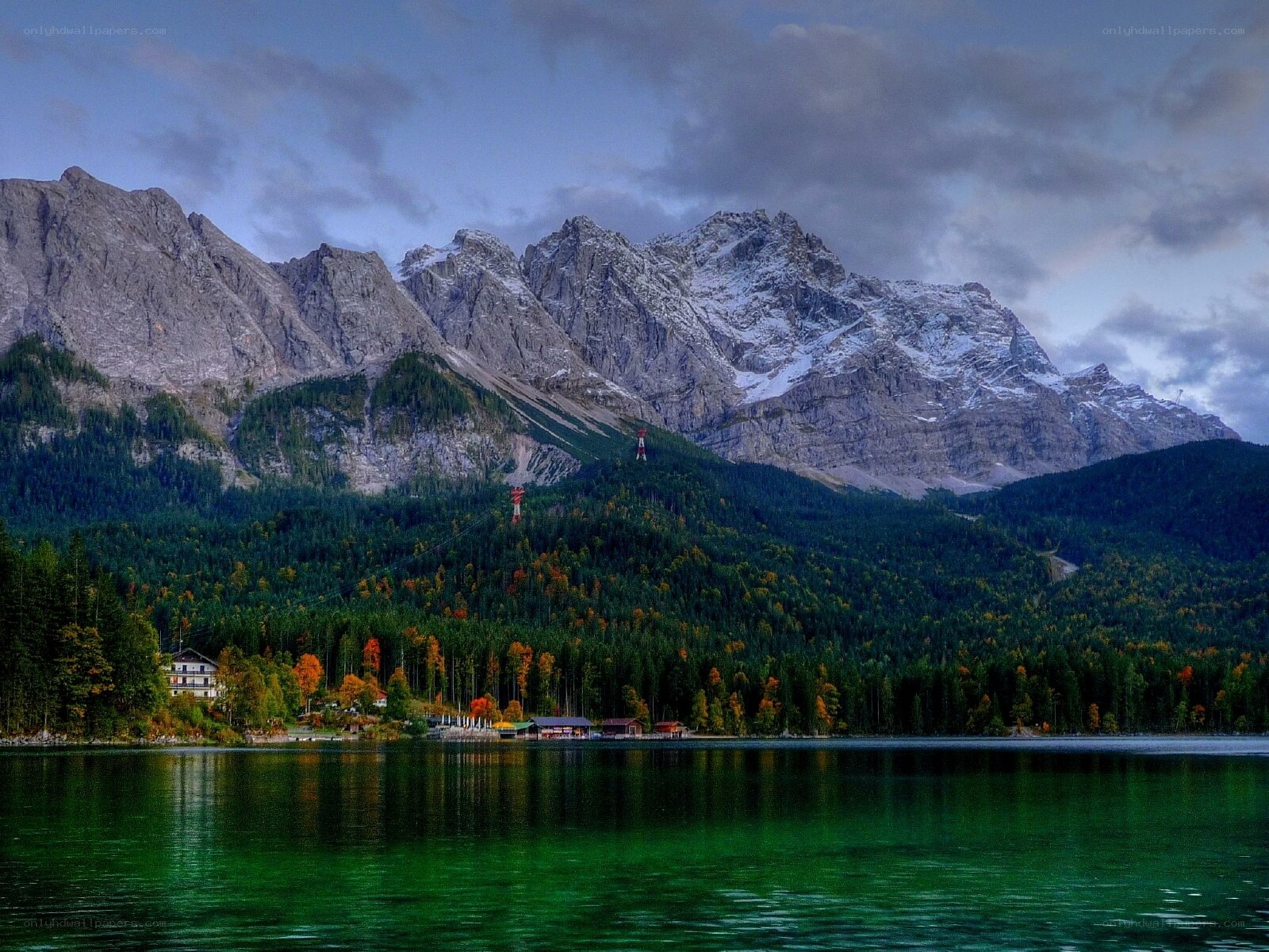 Mountain lake with autumn forest