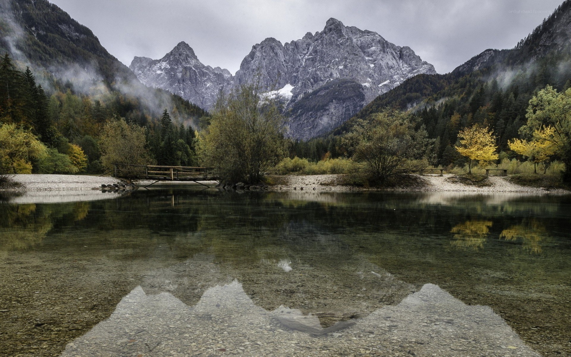 Mountain lake with autumn trees