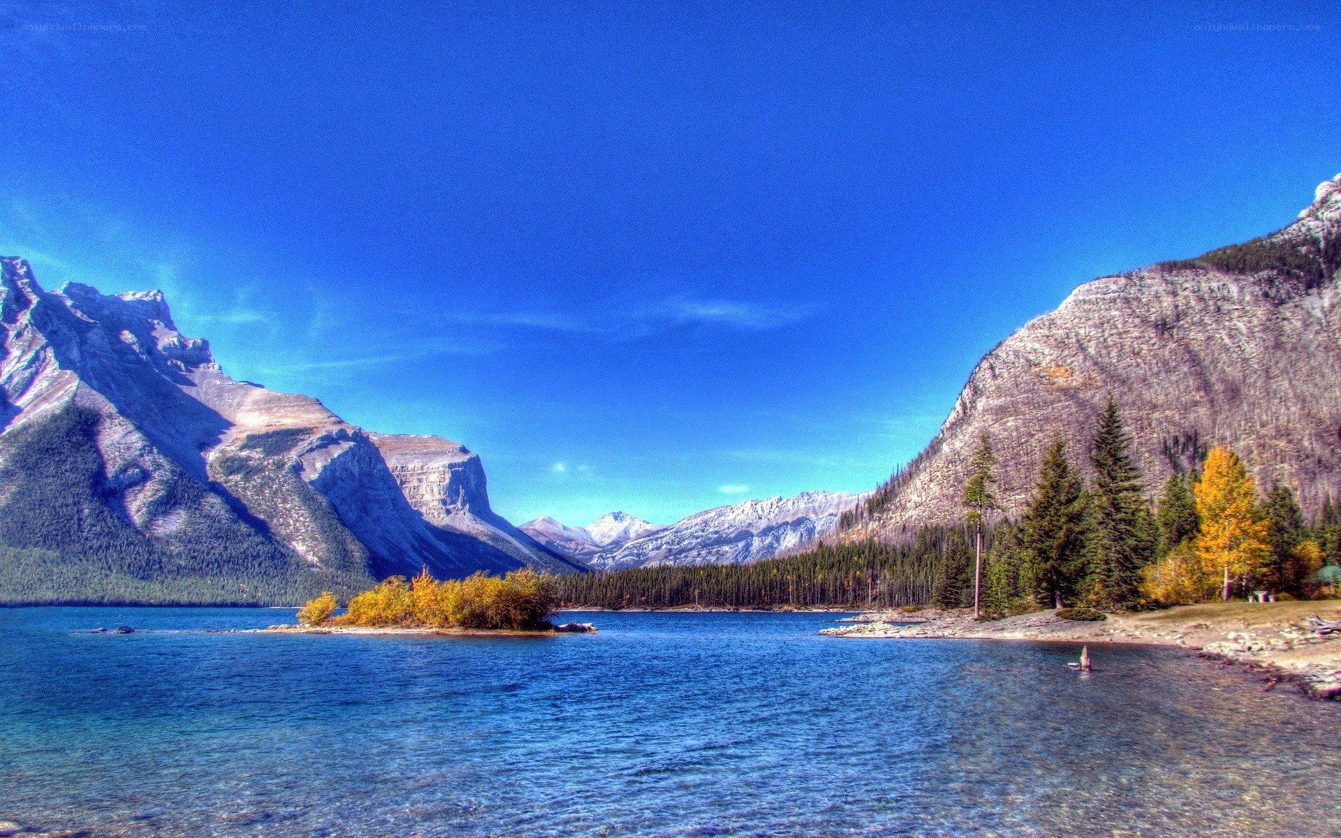 Mountain lake with autumn trees
