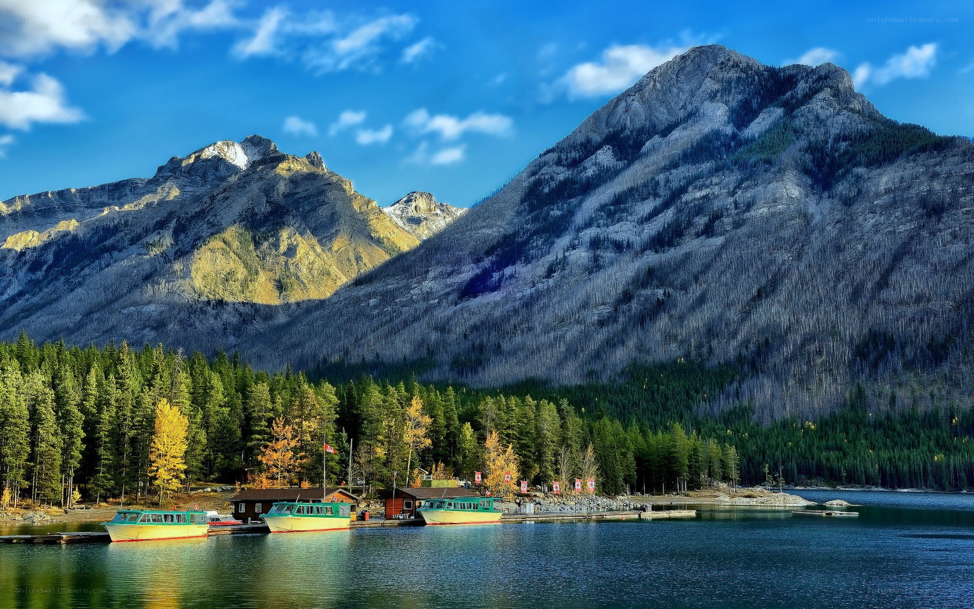 Mountain lake with boats