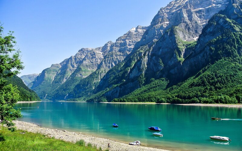 Mountain Lake with Boats — Blue, Serene, Afternoon, Photograph
