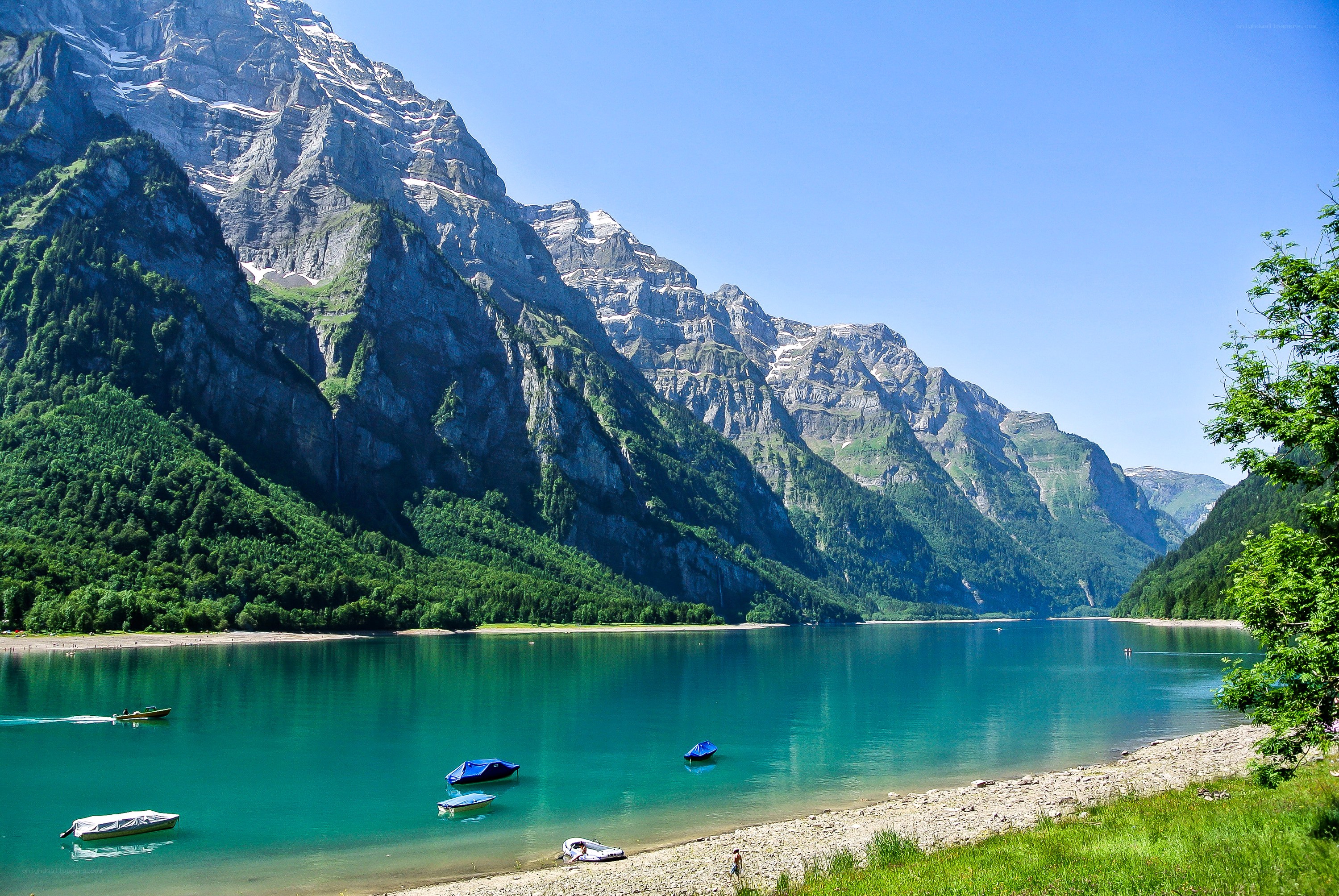 Mountain lake with boats