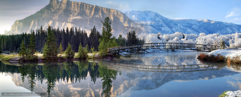 Mountain lake with bridge