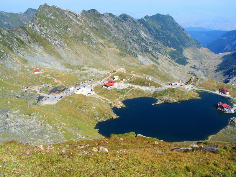 Mountain Lake with Buildings — Green