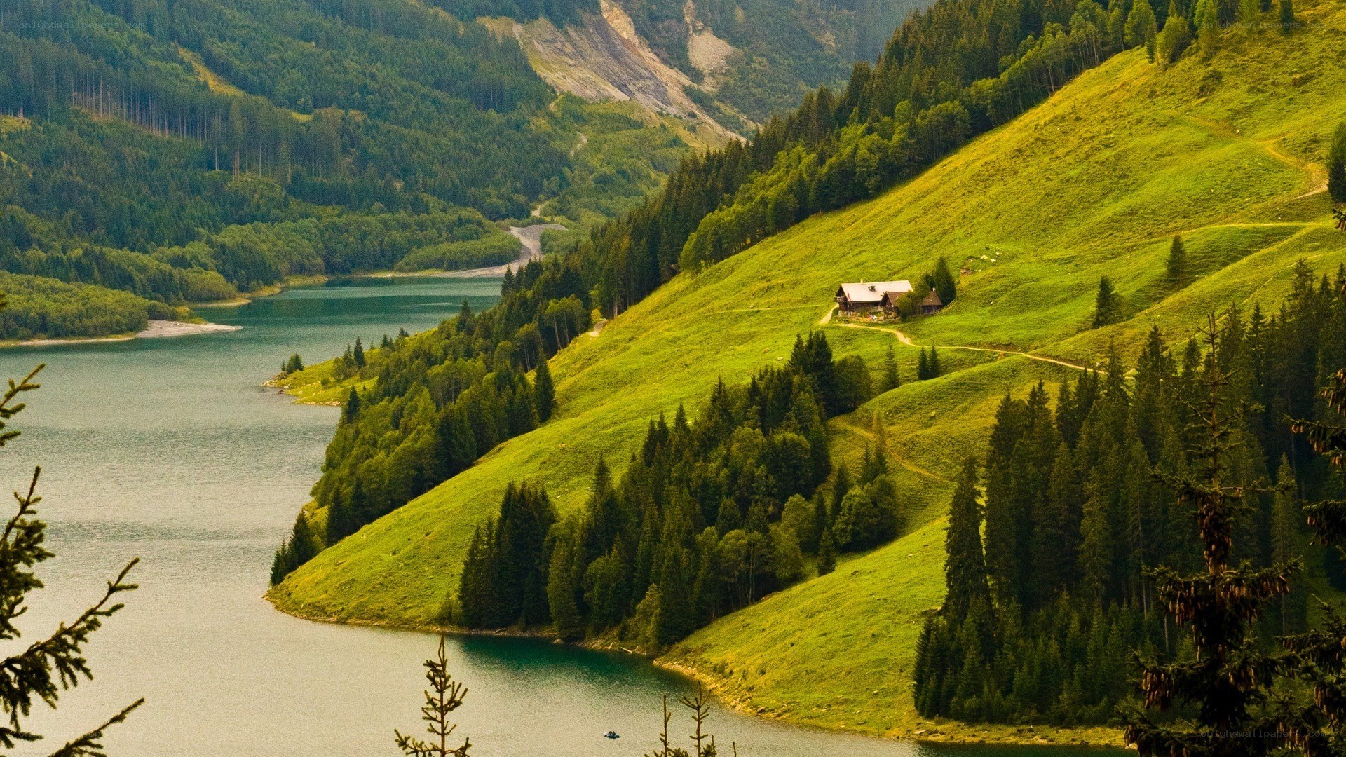 Mountain lake with cabin