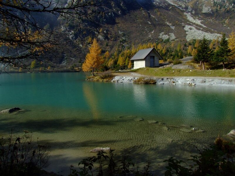 Mountain lake with cabin