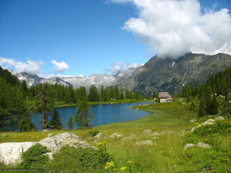 Mountain lake with cabin