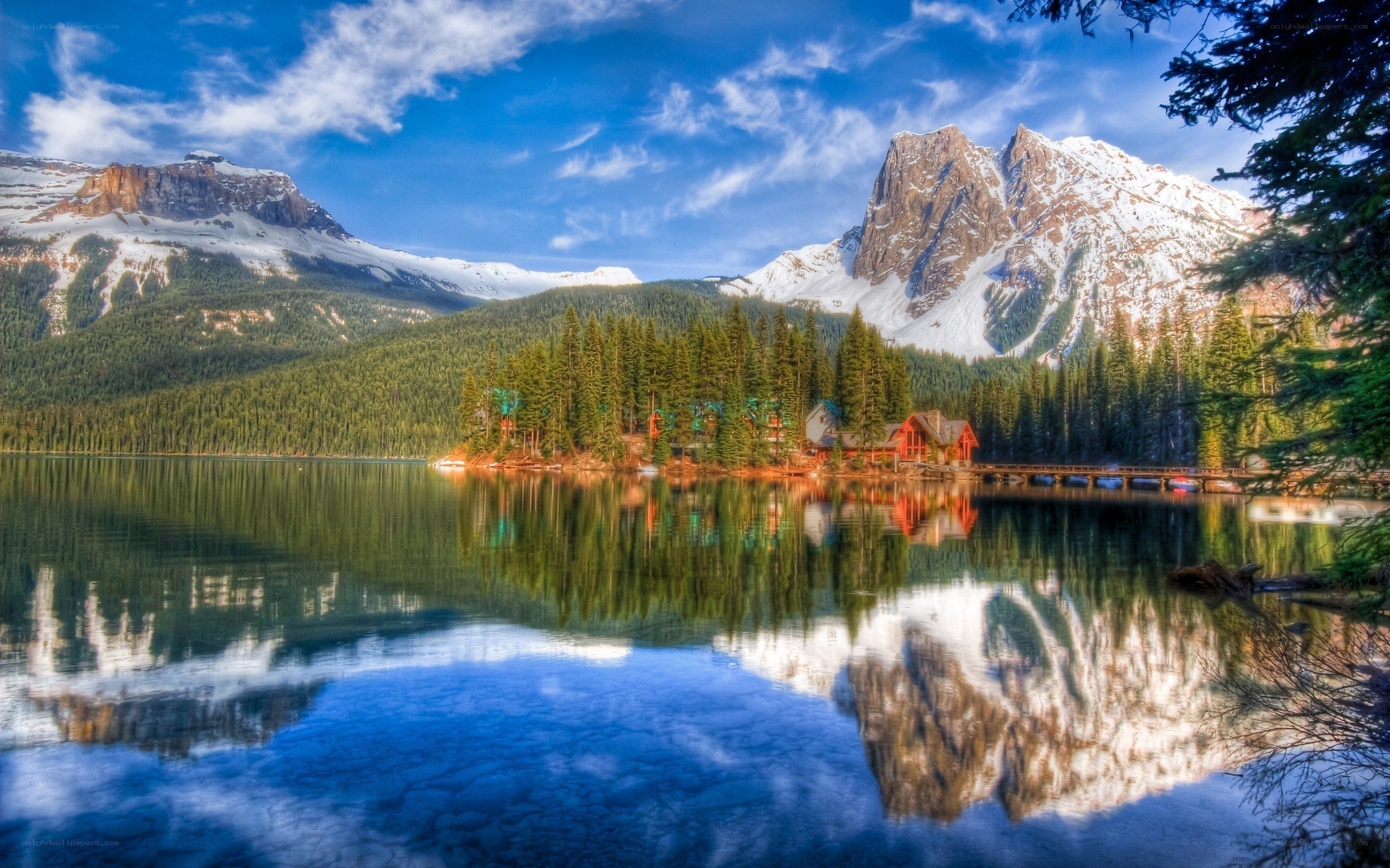 Mountain lake with cabin
