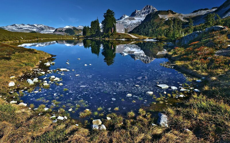Mountain Lake with Cabin — Blue, Serene, Afternoon, Photograph, Mountains, Trees