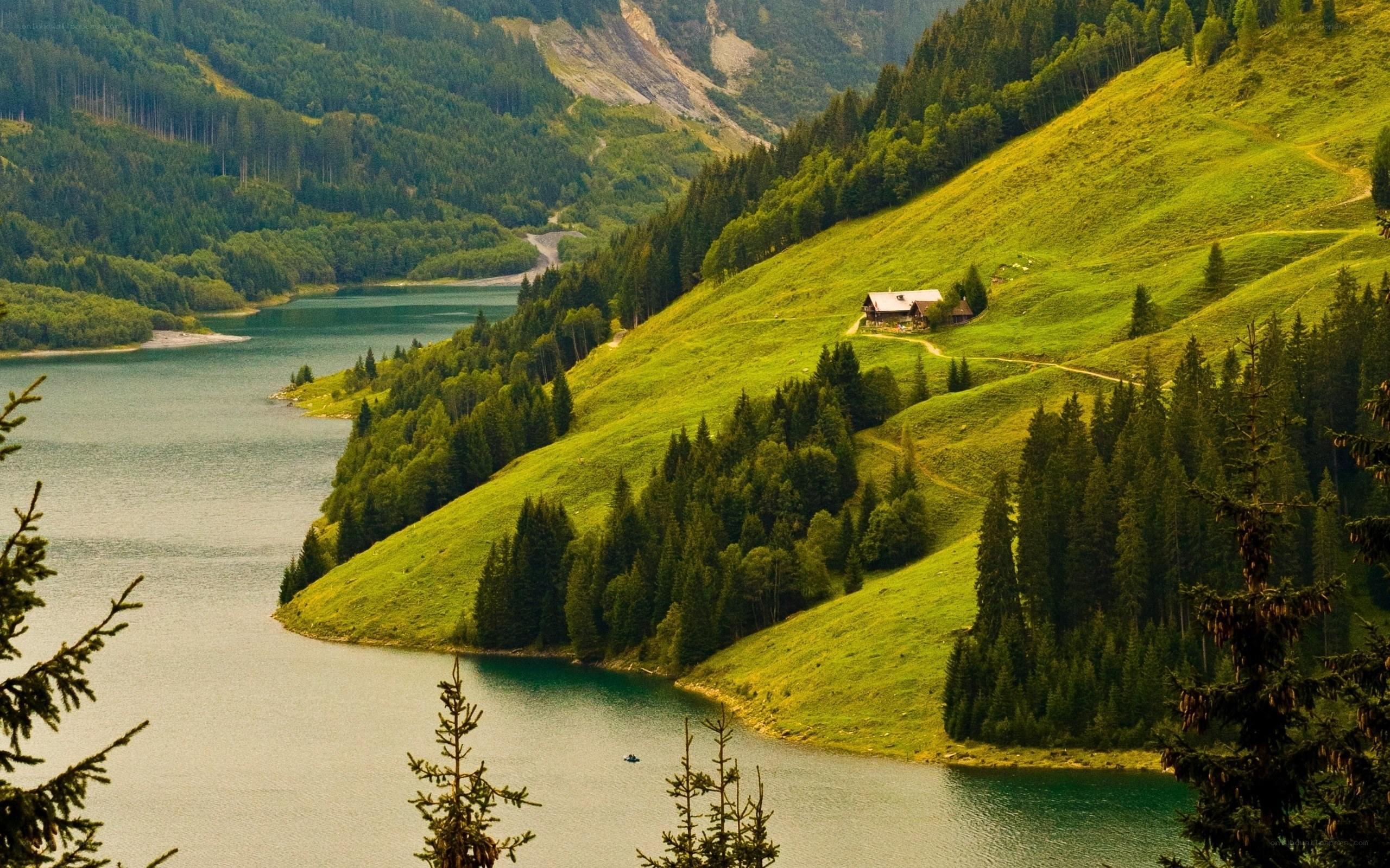 Mountain lake with cabin
