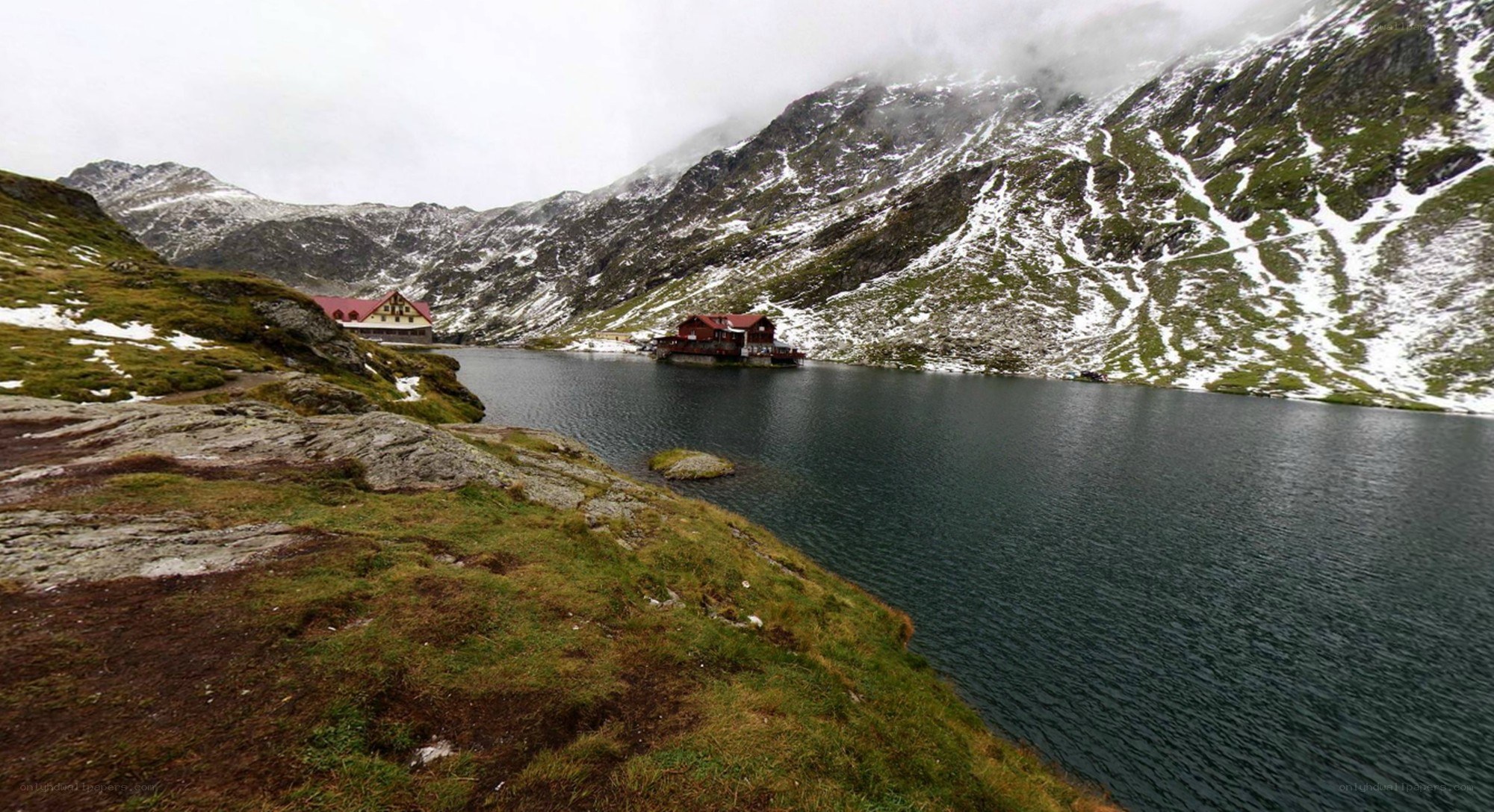 Mountain lake with cabins
