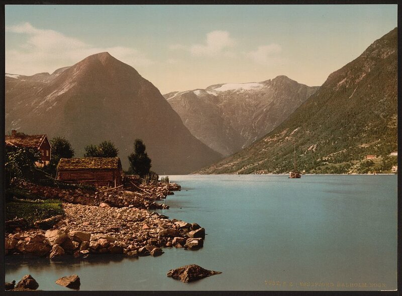 Mountain lake with cabins