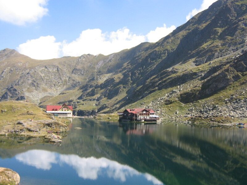 Mountain Lake with Cabins — Blue, Serene, Afternoon, Photograph, Mountains