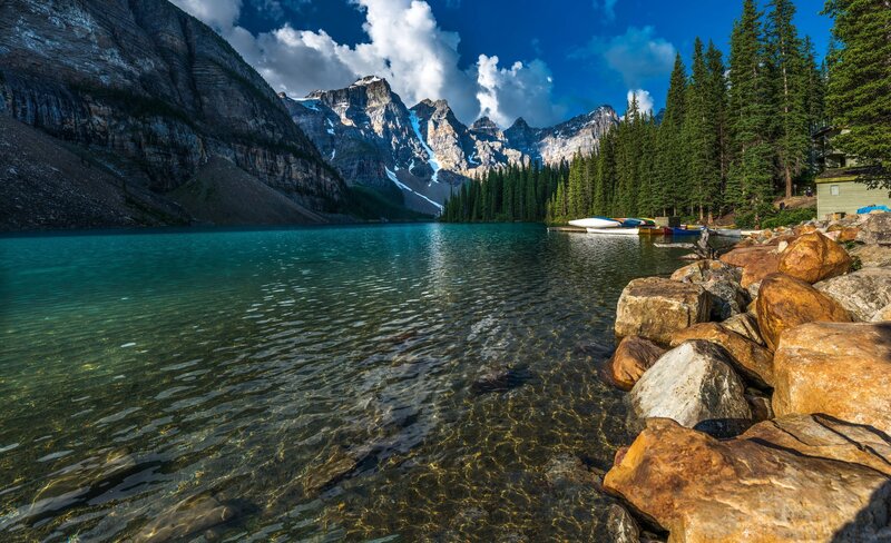 Mountain Lake with Canoes — Blue, Serene, Afternoon, Photograph