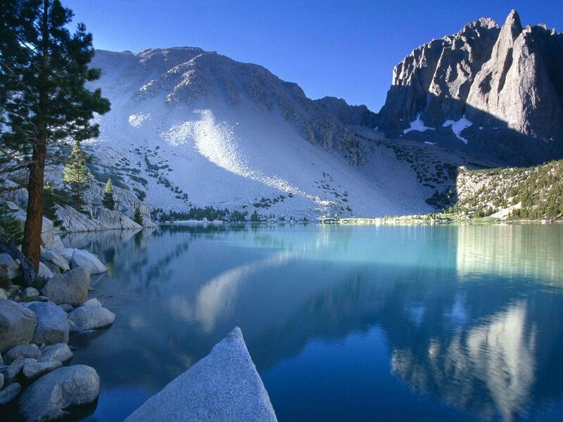 Mountain lake with clear blue water