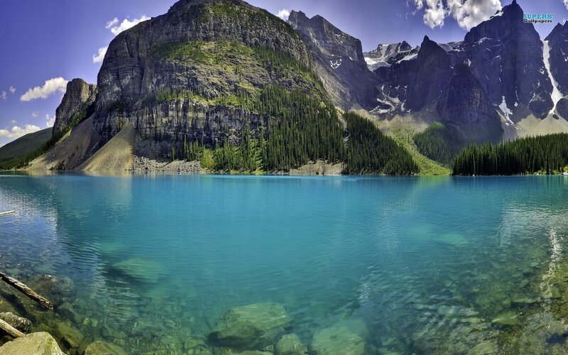 Mountain lake with clear blue water