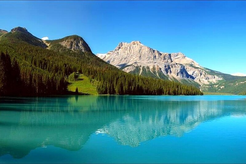 Mountain lake with clear reflection
