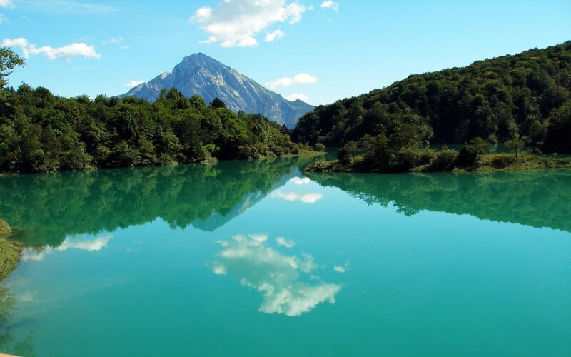Mountain lake with clear reflection