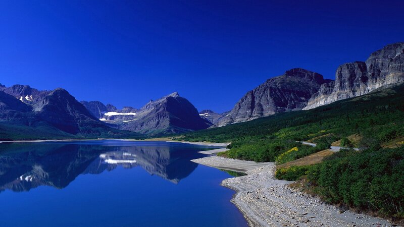 Mountain lake with clear reflection