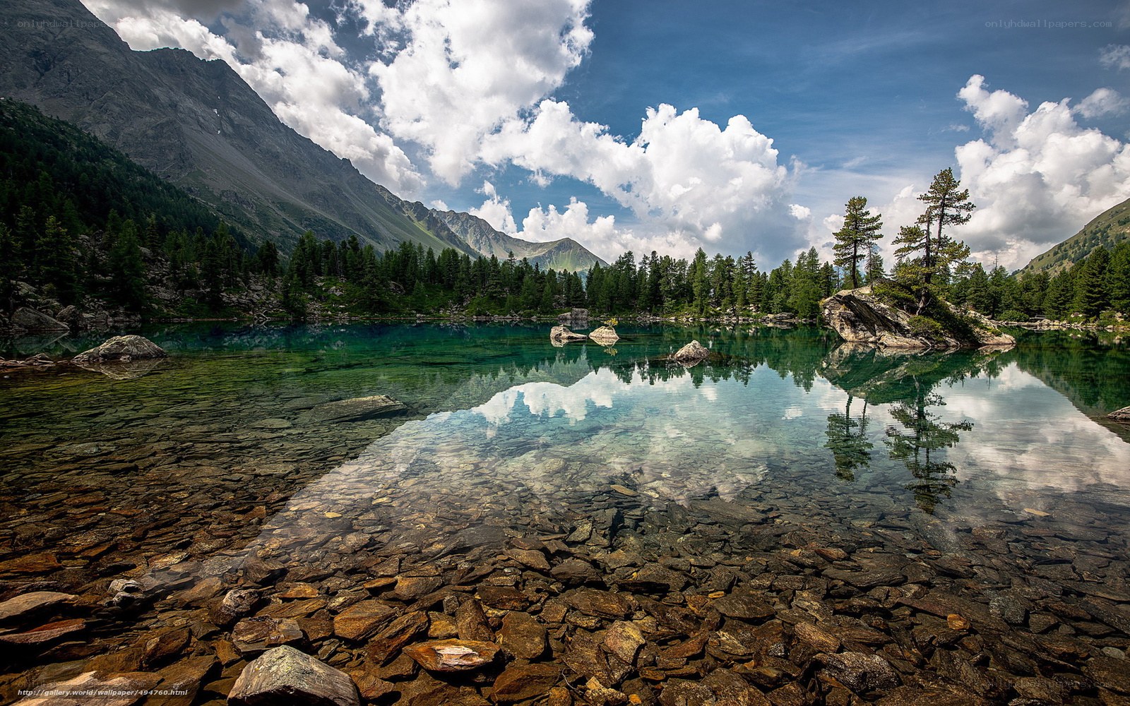Mountain lake with clear reflections