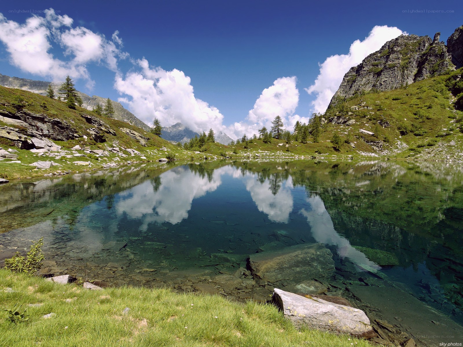 Mountain lake with clear reflections