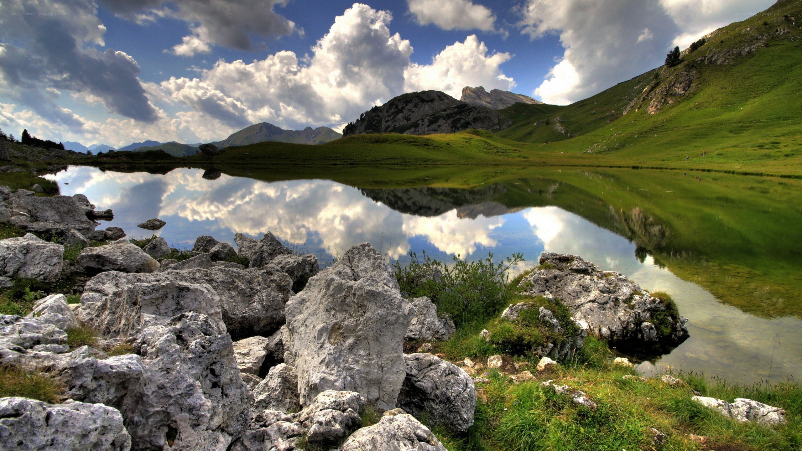 Mountain lake with cloud reflection