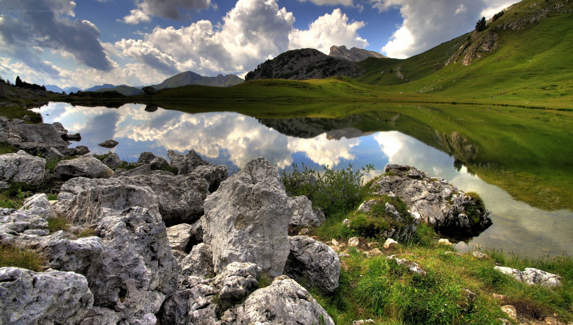 Mountain lake with cloud reflection
