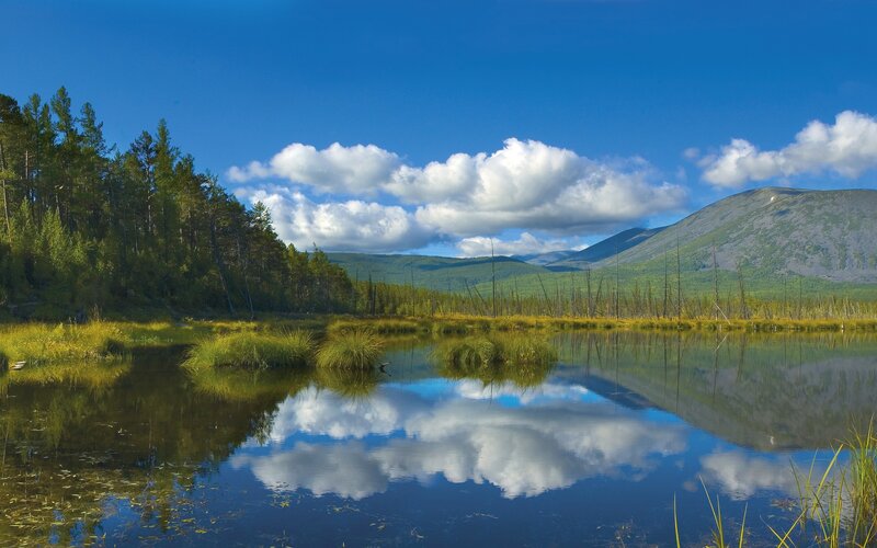 Mountain lake with cloud reflection