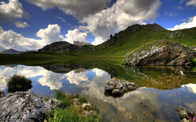 Mountain lake with cloud reflection