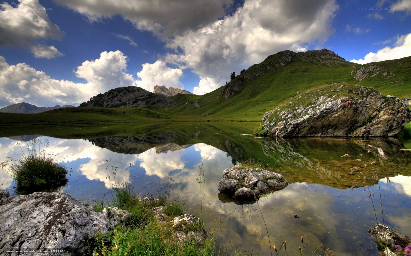 Mountain lake with cloud reflection