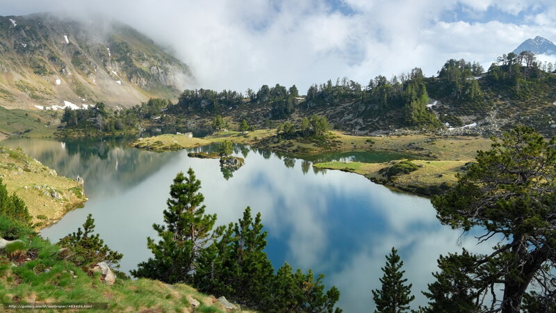 Mountain lake with cloud reflections