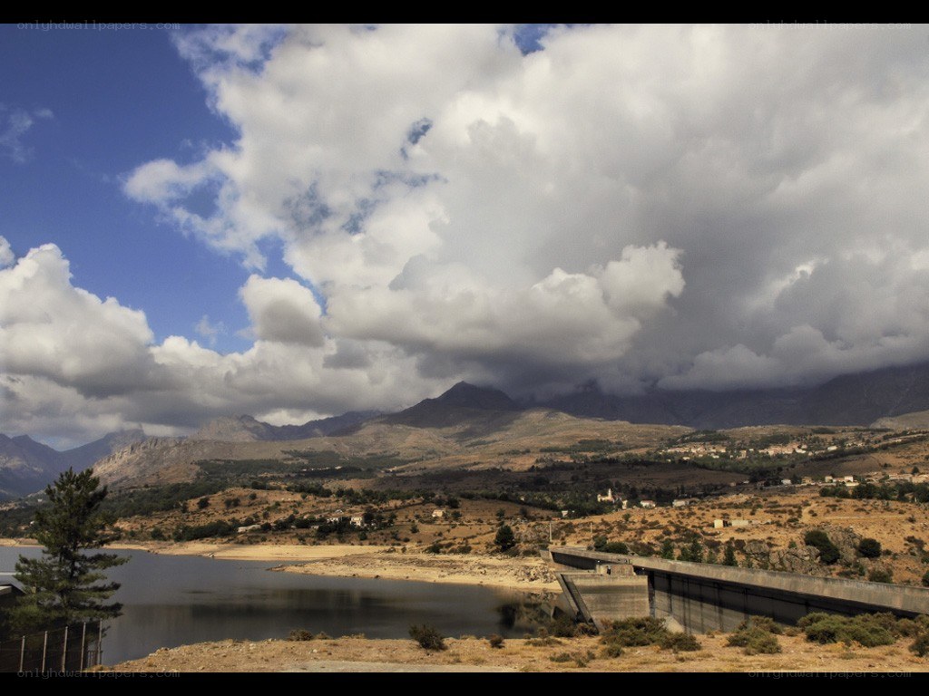 Mountain lake with dam