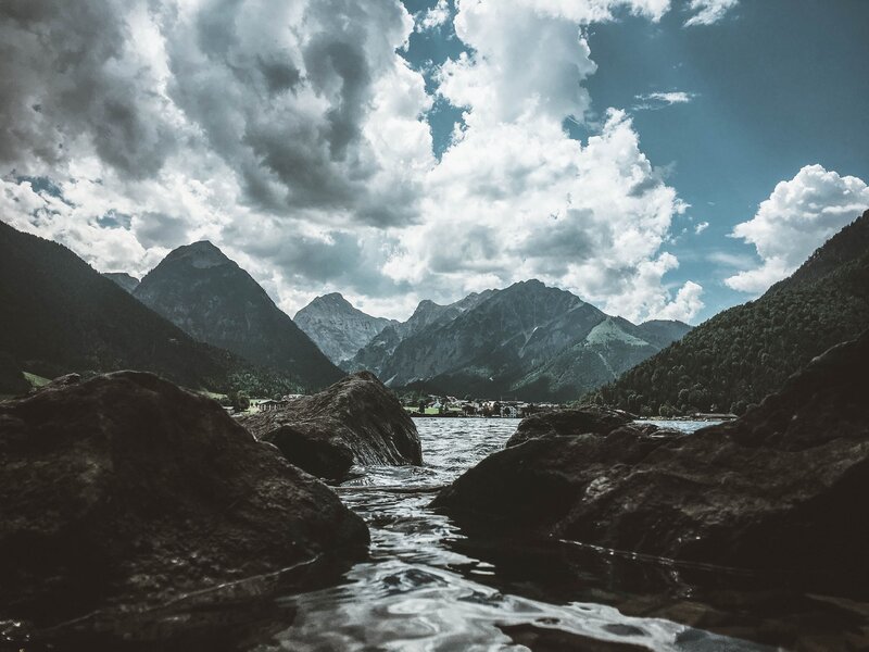 Mountain lake with dramatic clouds
