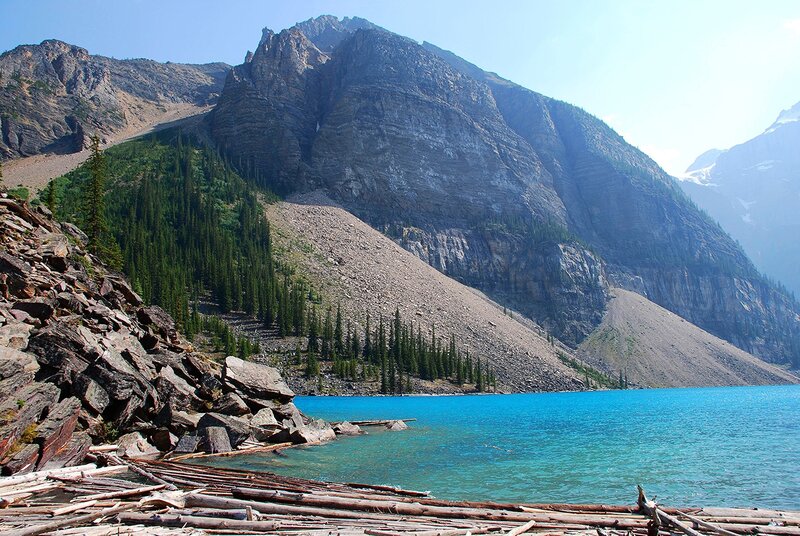 Mountain Lake with Driftwood — Blue, Serene, Afternoon