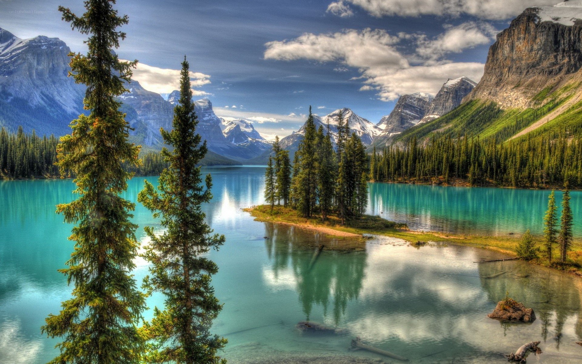 Mountain lake with evergreen trees