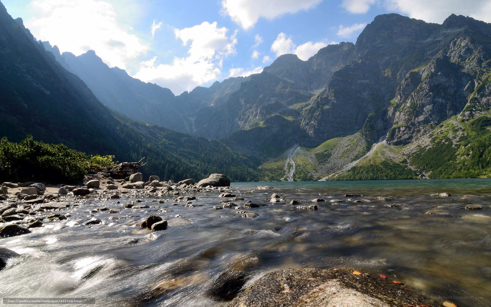 Mountain lake with flowing stream