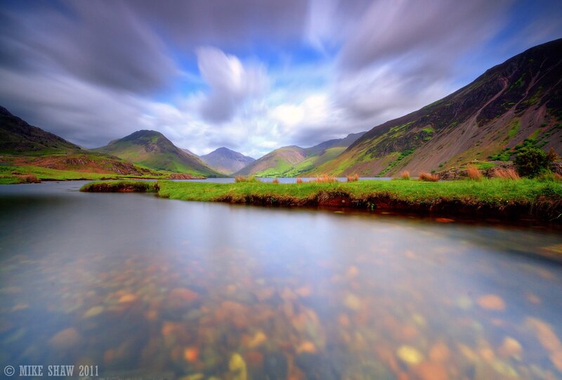 Mountain lake with flowing water