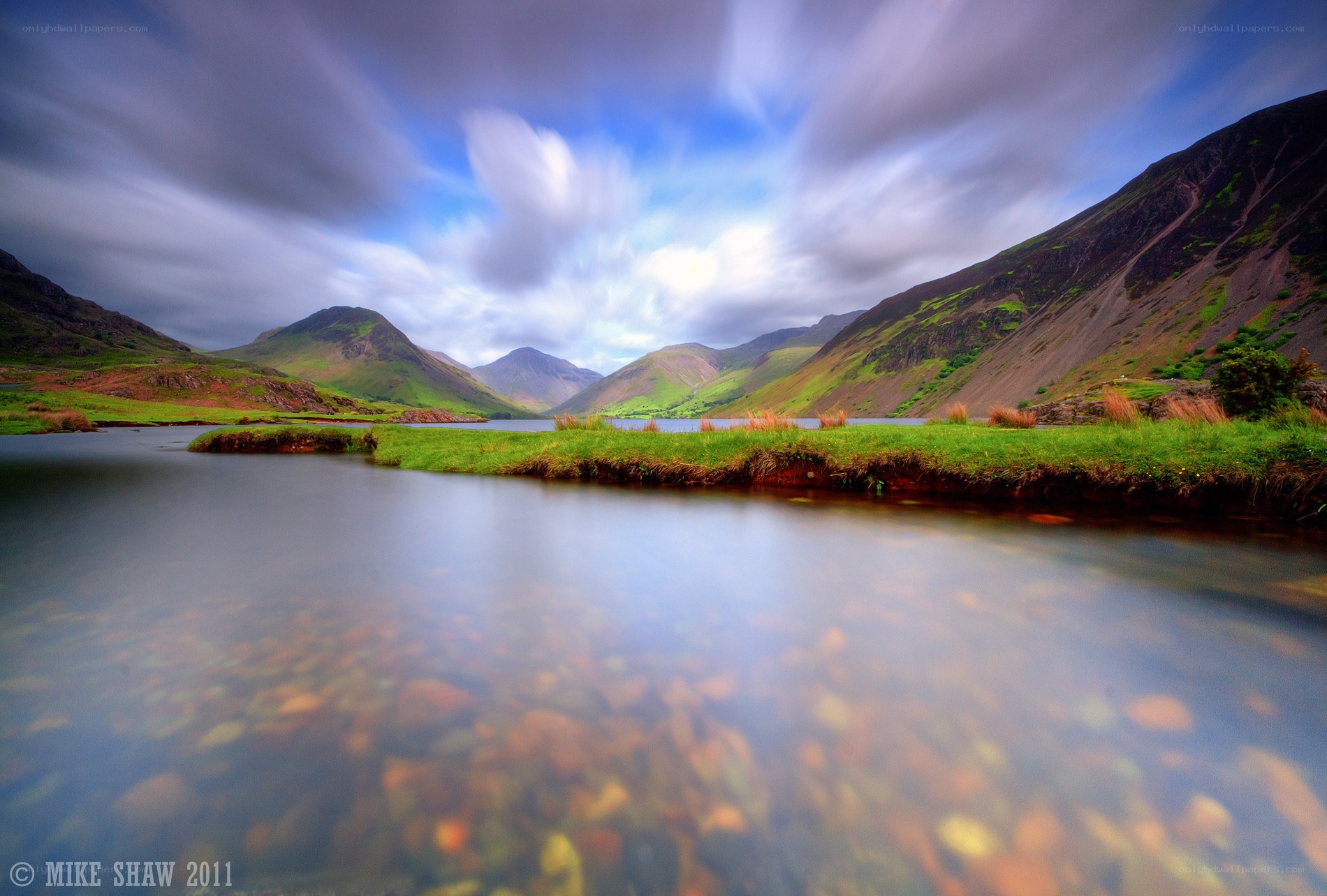 Mountain lake with flowing water