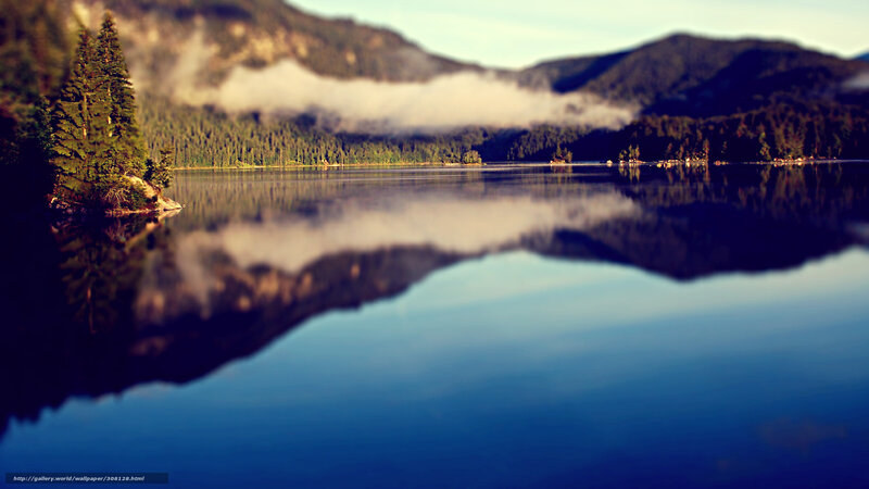 Mountain lake with fog reflection