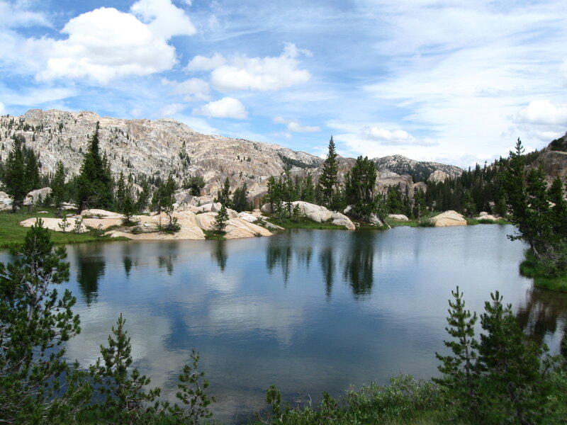 Mountain lake with forest and rocks