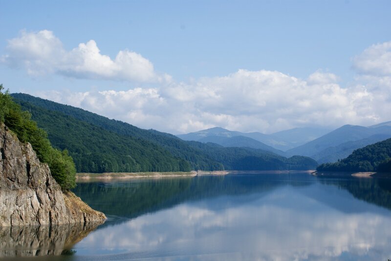 Mountain lake with forested hills