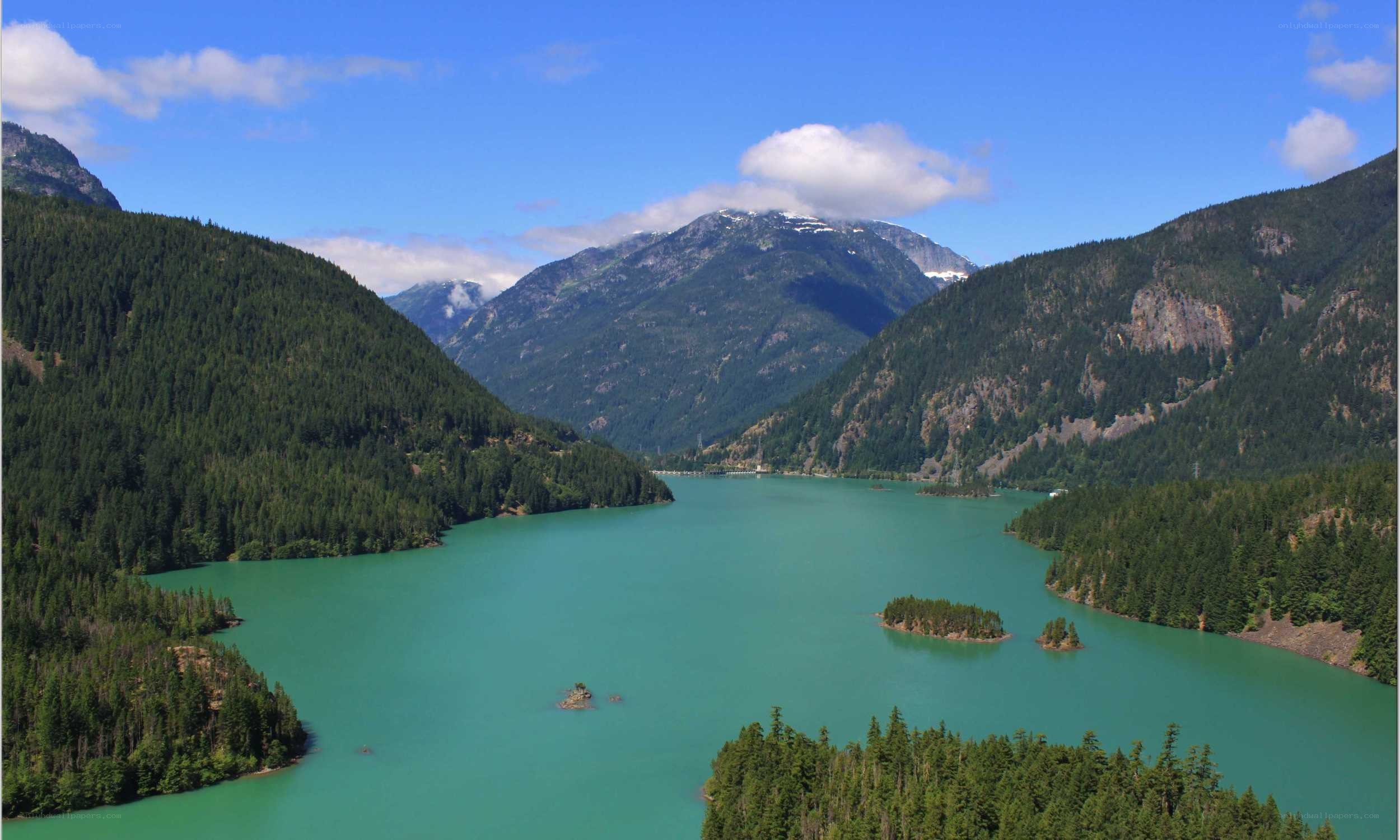 Mountain lake with forested hills
