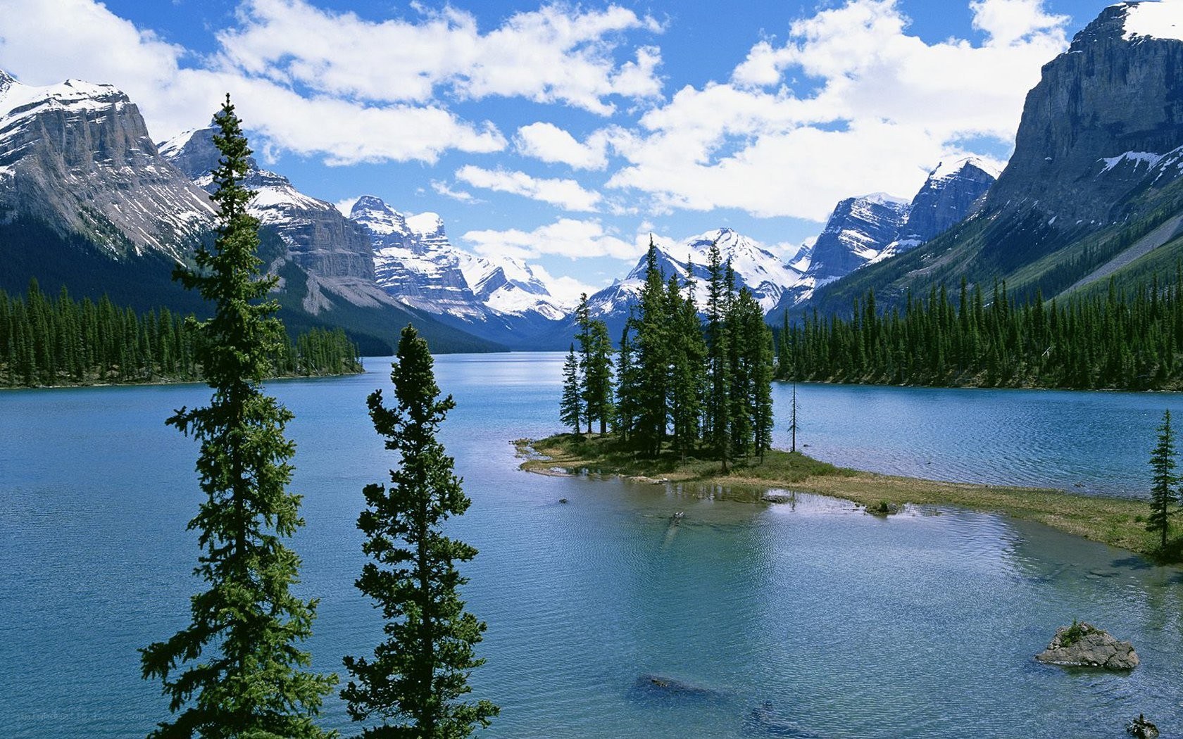 Mountain lake with forested island