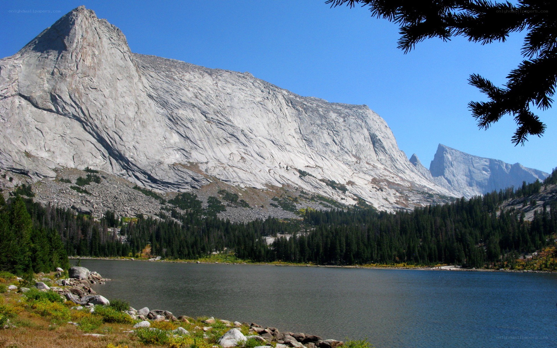 Mountain lake with granite peak