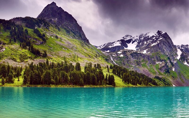 Mountain lake with green hills