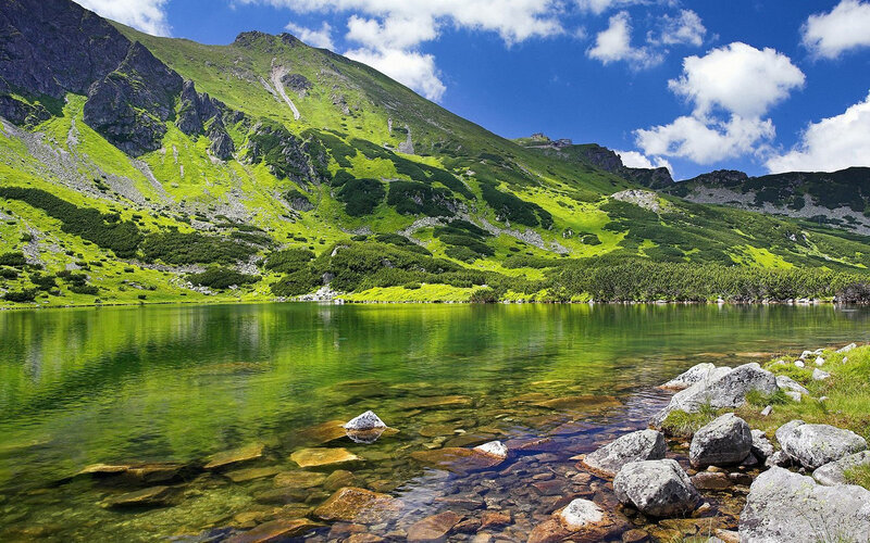 Mountain lake with green hills